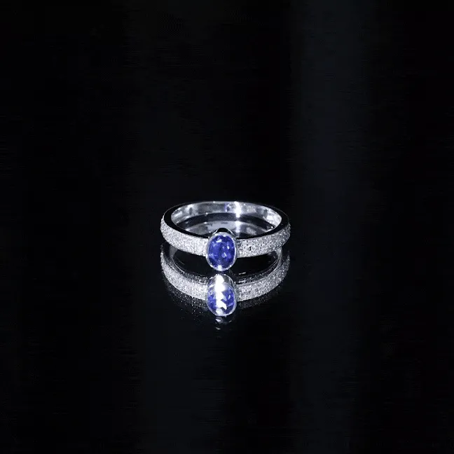 Oval Created Blue Sapphire Solitaire Engagement Ring with Diamond Side Stones