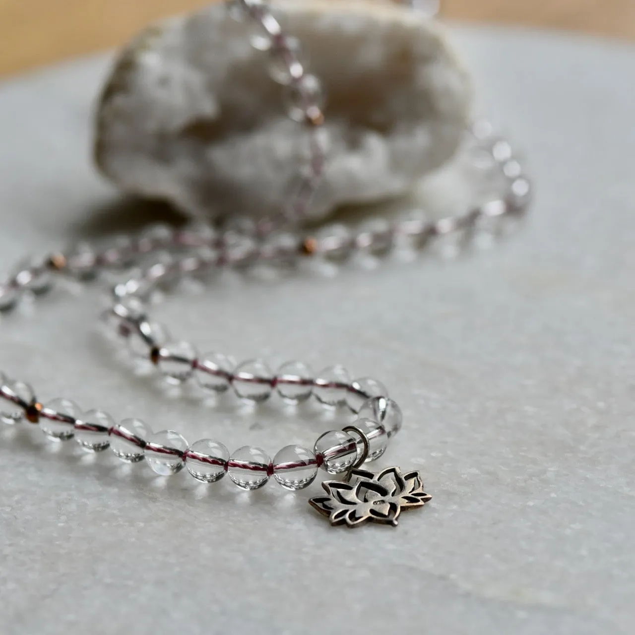 Silver Lotus Gemstone Mala with 108 Crystal Clear Quartz beads